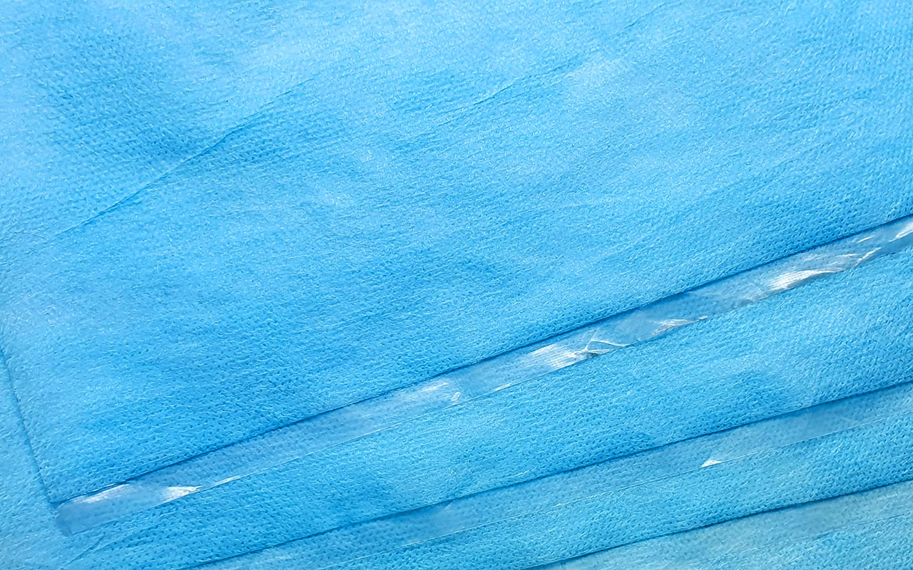 Breathable double-layer laminated non-woven fabric